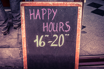 Image showing Happy hour board with text