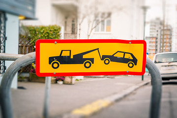 Image showing Street sign of a car being removed