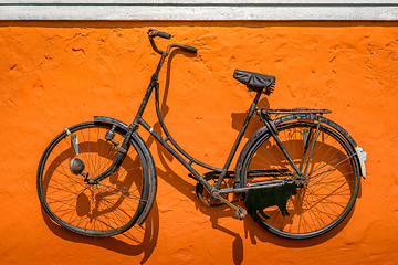Image showing Vintage bike hanging on a wall