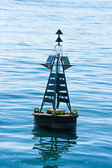 Image showing Close-up of a buoy in the blue sea