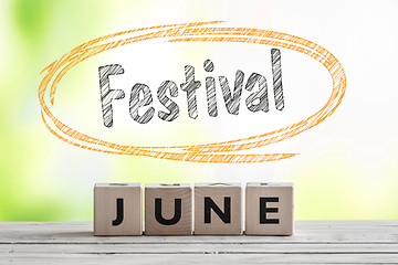 Image showing June festival sign on a wooden stage