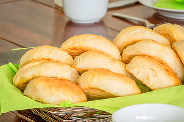 Image showing Buns in a basket on a table