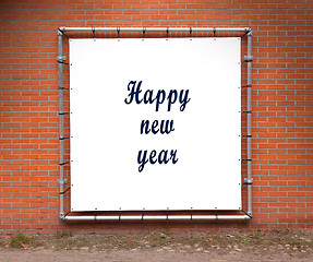 Image showing Large banner with inspirational quote on a brick wall