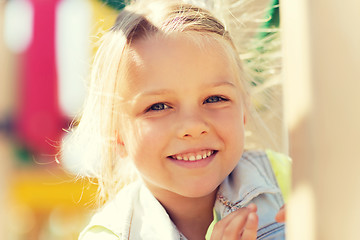 Image showing happy little girl climbing on children playground