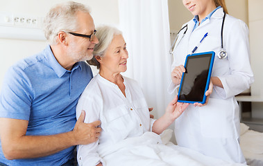 Image showing senior woman and doctor with tablet pc at hospital