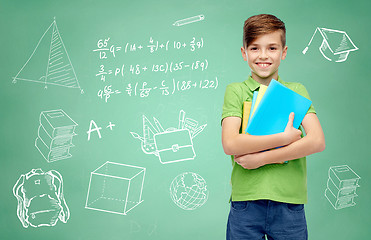 Image showing happy student boy with folders and notebooks