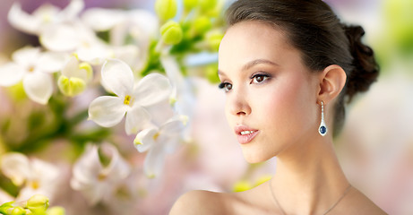 Image showing close up of beautiful woman face with earring