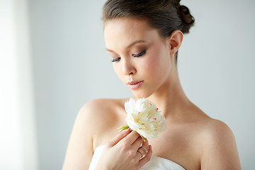 Image showing beautiful asian woman with flower and jewelry