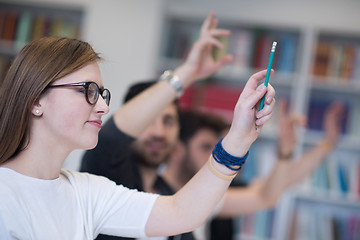 Image showing group of students  raise hands up