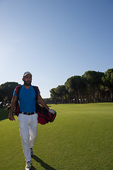 Image showing golf player walking