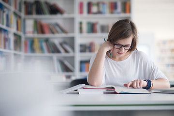 Image showing female student study in school library