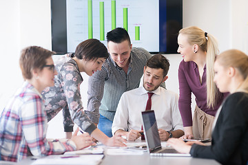 Image showing young business people group on meeting at modern office