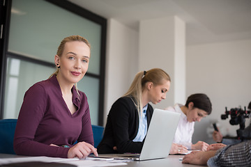 Image showing young business people group on team meeting at modern office