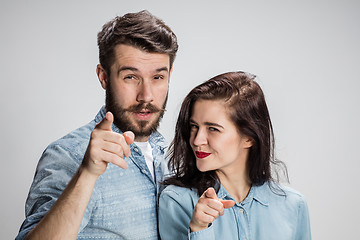 Image showing The business man and woman on a gray background