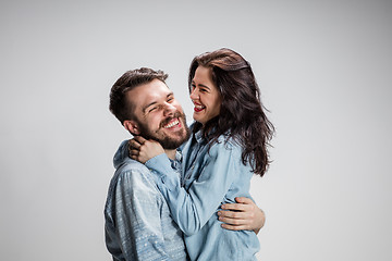 Image showing Portrait of happy couple on gray background