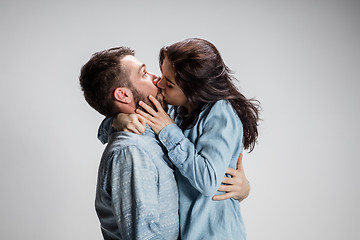 Image showing Portrait of happy couple on gray background