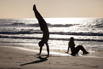 Image showing Happy couple having fun on beach.