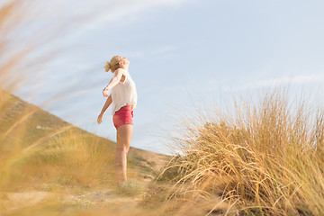 Image showing Free Happy Woman Enjoying Sun on Vacations.