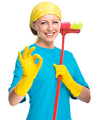 Image showing Young woman as a cleaning maid