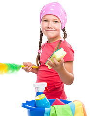 Image showing Young girl is dressed as a cleaning maid