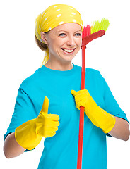 Image showing Young woman as a cleaning maid