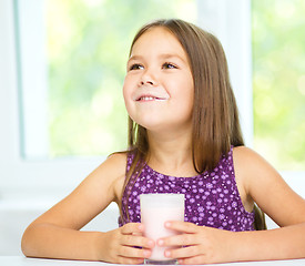 Image showing Cute little girl showing milk moustache