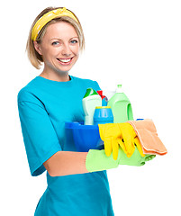 Image showing Young woman as a cleaning maid