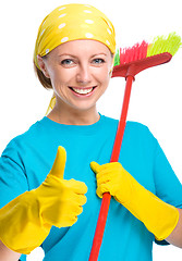 Image showing Young woman as a cleaning maid