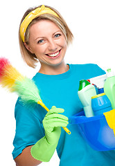 Image showing Young woman as a cleaning maid