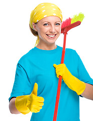 Image showing Young woman as a cleaning maid