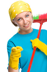 Image showing Young woman as a cleaning maid