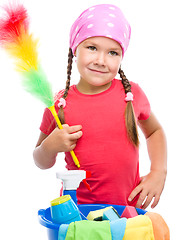 Image showing Young girl is dressed as a cleaning maid