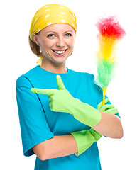 Image showing Young woman as a cleaning maid