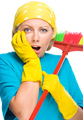 Image showing Young woman as a cleaning maid