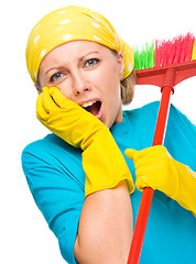 Image showing Young woman as a cleaning maid