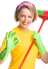 Image showing Young woman as a cleaning maid