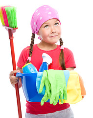 Image showing Young girl is dressed as a cleaning maid