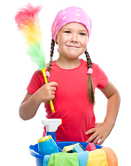 Image showing Young girl is dressed as a cleaning maid