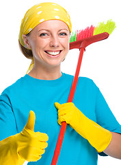 Image showing Young woman as a cleaning maid