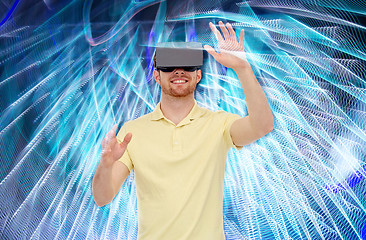 Image showing happy man in virtual reality headset or 3d glasses