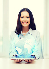 Image showing businesswoman with tablet pc comuter and globe