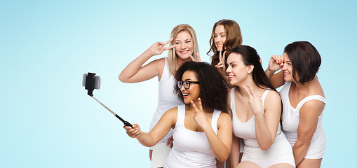 Image showing group of happy women taking selfie by smartphoone