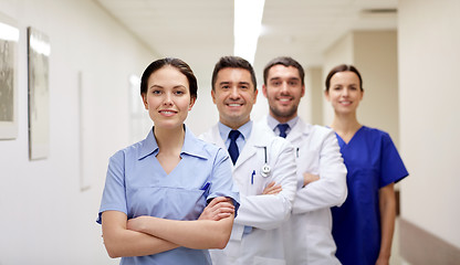 Image showing group of happy medics or doctors at hospital