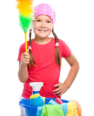 Image showing Young girl is dressed as a cleaning maid