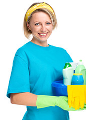 Image showing Young woman as a cleaning maid