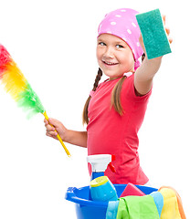 Image showing Young girl is dressed as a cleaning maid