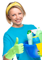 Image showing Young woman as a cleaning maid