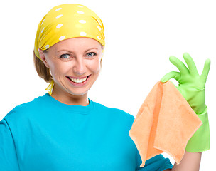 Image showing Young woman holding cleaning rag