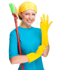 Image showing Young woman as a cleaning maid