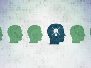 Image showing Finance concept: head with light bulb icon on Digital Data Paper background